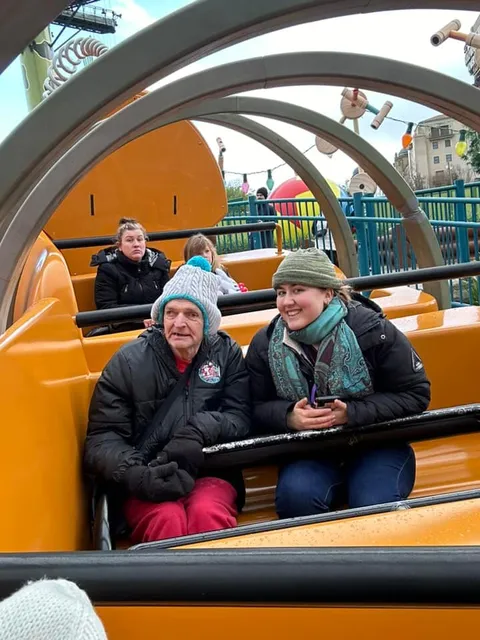 Two holidaymakers enjoying a ride together