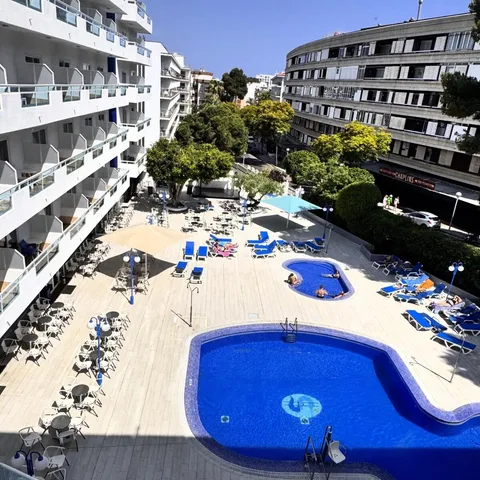 The hotel pool and sun terrace seen from above